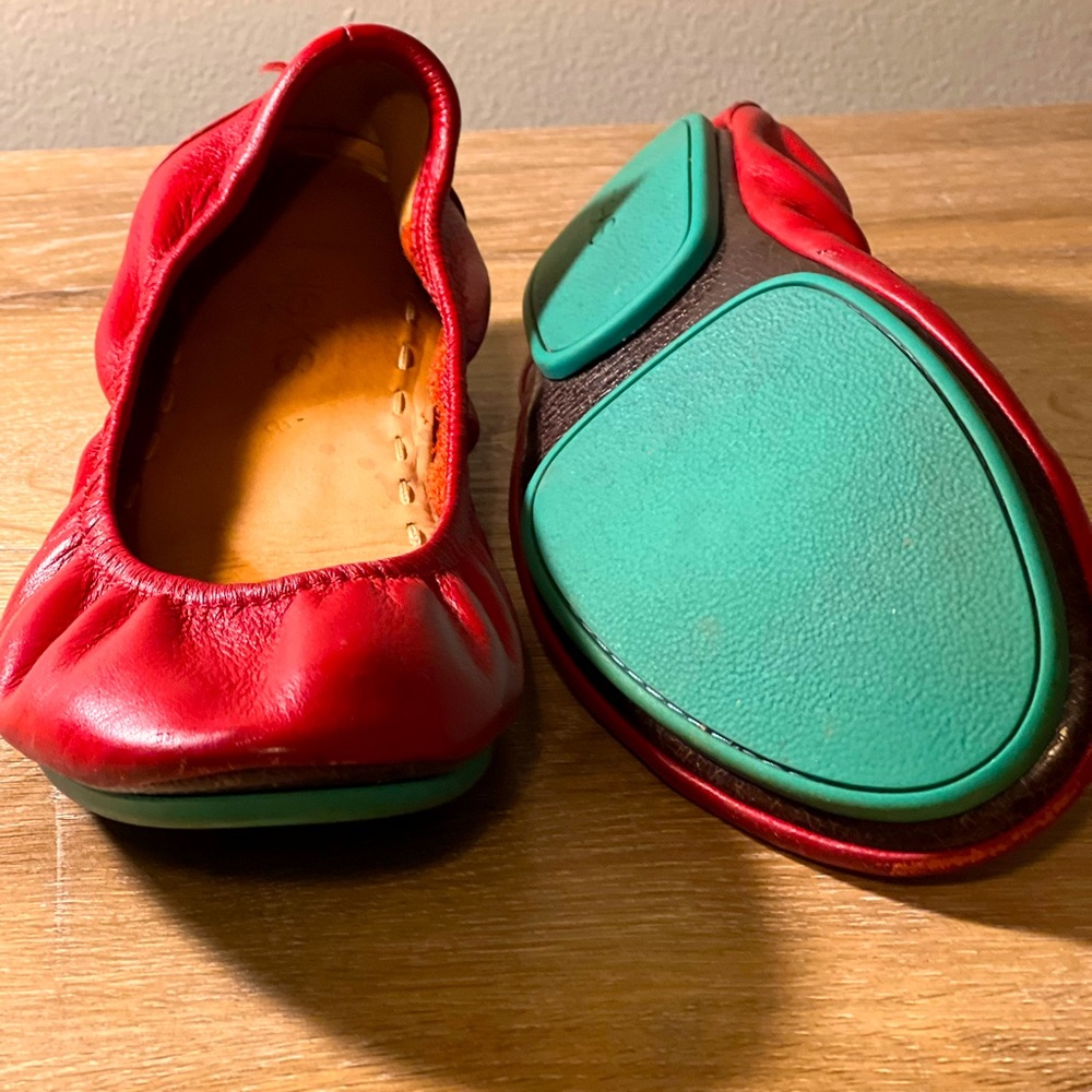 Red Tieks.Good condition.There is a scoff on the front and small at back.